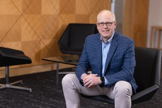 portrait of a smiling person in professional attire